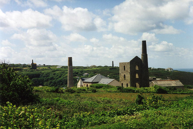 St Agnes: Wheal Kitty. Two Cornish engine houses (Saras Shaft nearest) and four stacks are evident in this view.