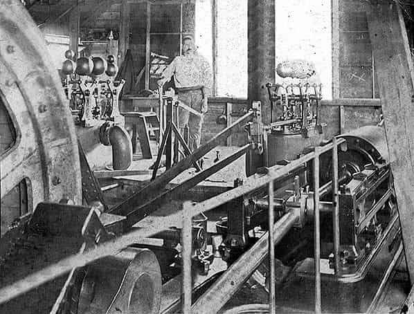 Engine hand Charles Gatehouse is seen in the winding house at Shakespeare Colliery circa late 1890s (White Cliffs Countryside Partnership), submitted by Buddle-Bot on 05-10-2024.
Public Domain Engine hand Charles Gatehouse is seen in the winding house at Shakespeare Colliery circa late 1890s (White Cliffs Countryside Partnership)
