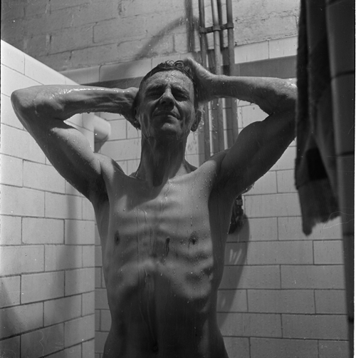 Image of a Miner Showering, submitted by Buddle-Bot on 01-03-2025.
with permission © Harold White https://www.ncm.org.uk/collections/topics/harold-white/ Image of a Miner Showering