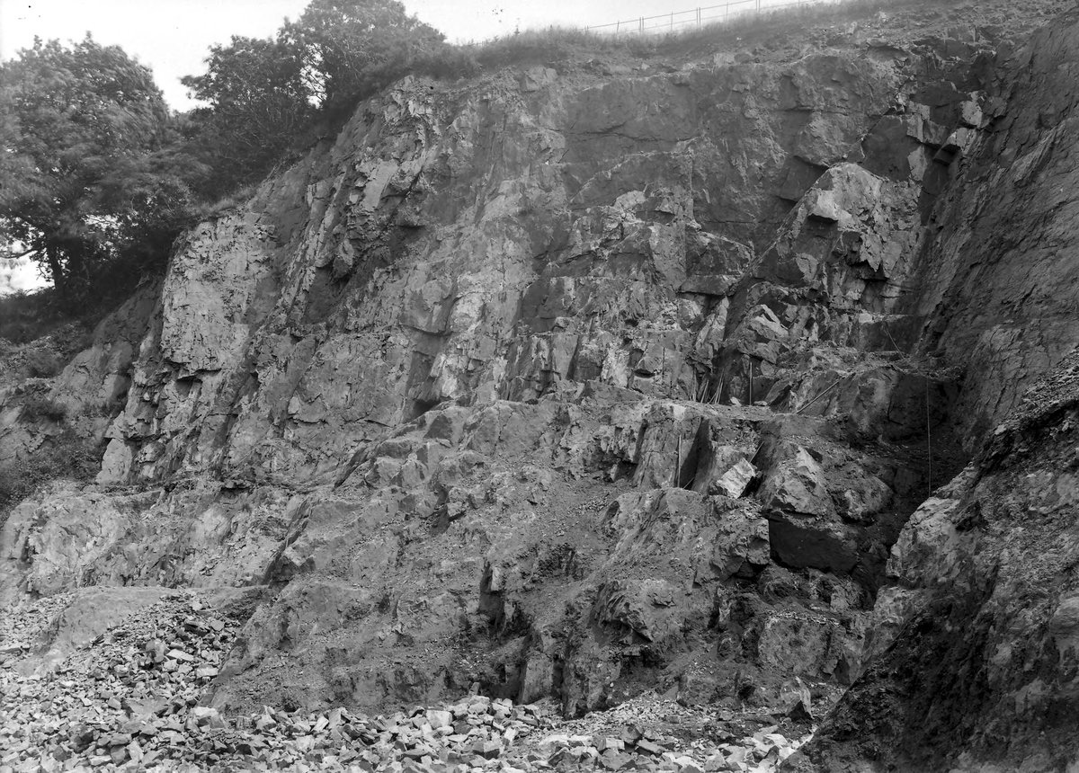 Jul 1907 - Quarry on E. side of stream, SW of Tremore, Lanivet. Looking ESE., submitted by Buddle-Bot on 08-11-2025.
Bgs No. P200418; Hall, T.C.; © Crown. Image & Text: BGS Geoscenic, under OGL V2 License http://bit.ly/462AXmV Jul 1907 - Quarry on E. side of stream, SW of Tremore, Lanivet. Looking ESE.