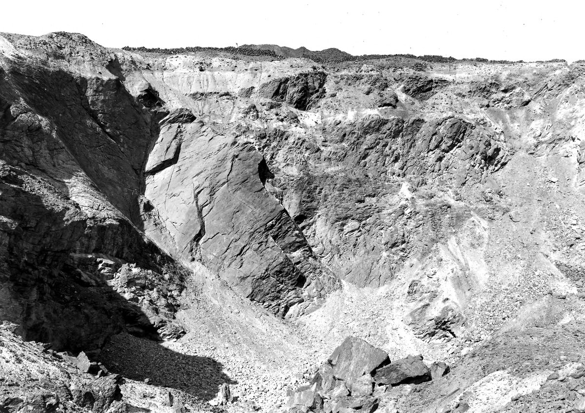 18 Aug 1911 - E. end of West Pit, Parys Mountain. Looking NE., submitted by Buddle-Bot on 08-11-2025.
Bgs No. P201226; Rhodes, J.; © Crown. Image & Text: BGS Geoscenic, under OGL V2 License http://bit.ly/462AXmV 18 Aug 1911 - E. end of West Pit, Parys Mountain. Looking NE.