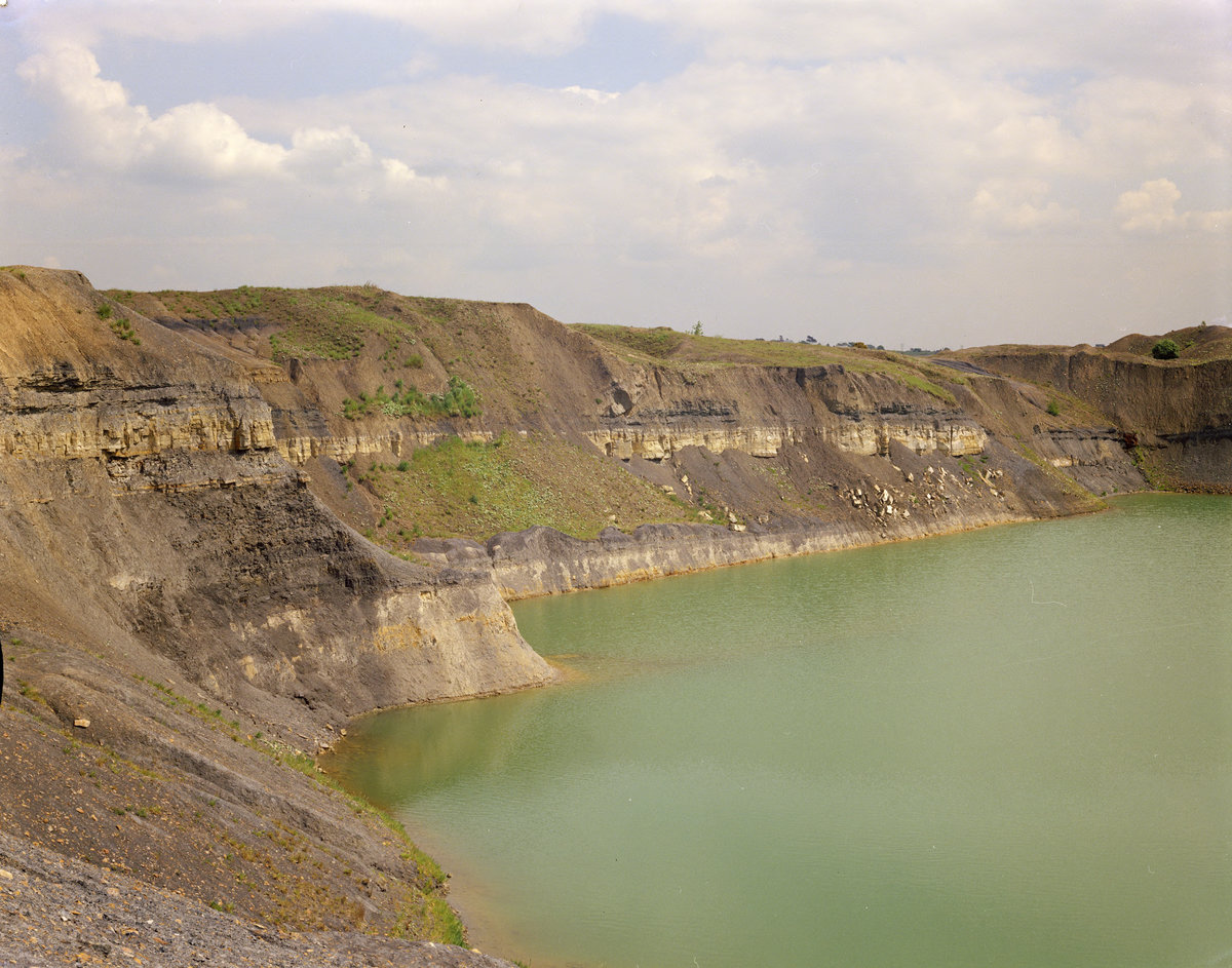 1971 - Disused quarry, 250 m. SW of site of Union Lodge, Woodville. Looking E., submitted by Buddle-Bot on 08-11-2025.
Bgs No. P211351; Evans, H.J.; © NERC. Image & Text: BGS Geoscenic, under OGL V2 License http://bit.ly/462AXmV 1971 - Disused quarry, 250 m. SW of site of Union Lodge, Woodville. Looking E.