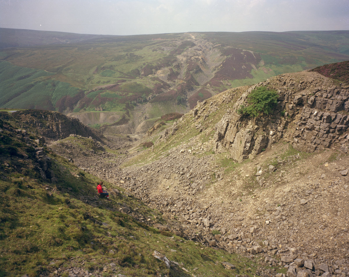 Sep 1978 - Friarfold Hush, Gunnerside Gill, Swaledale. Looking W. down the hush., submitted by Buddle-Bot on 08-11-2025.
Bgs No. P222811; Thornton, K.E.; © NERC. Image & Text: BGS Geoscenic, under OGL V2 License http://bit.ly/462AXmV Sep 1978 - Friarfold Hush, Gunnerside Gill, Swaledale. Looking W. down the hush.