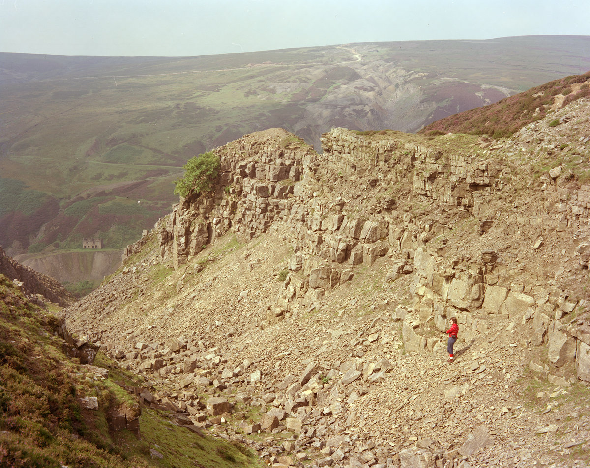 Sep 1978 - Friarfold Hush, Gunnerside Gill, Swaledale. Looking W. down the hush., submitted by Buddle-Bot on 08-11-2025.
Bgs No. P222812; Thornton, K.E.; © NERC. Image & Text: BGS Geoscenic, under OGL V2 License http://bit.ly/462AXmV Sep 1978 - Friarfold Hush, Gunnerside Gill, Swaledale. Looking W. down the hush.