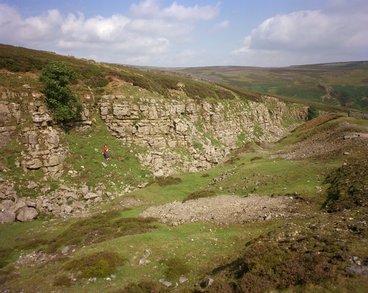 Sep 1978 - North Rake Hush (N. wall), above Booze, Arkengarthdale. Looking NE., submitted by Buddle-Bot on 08-11-2025.
Bgs No. P222826; Thornton, K.E.; © NERC. Image & Text: BGS Geoscenic, under OGL V2 License http://bit.ly/462AXmV Sep 1978 - North Rake Hush (N. wall), above Booze, Arkengarthdale. Looking NE.