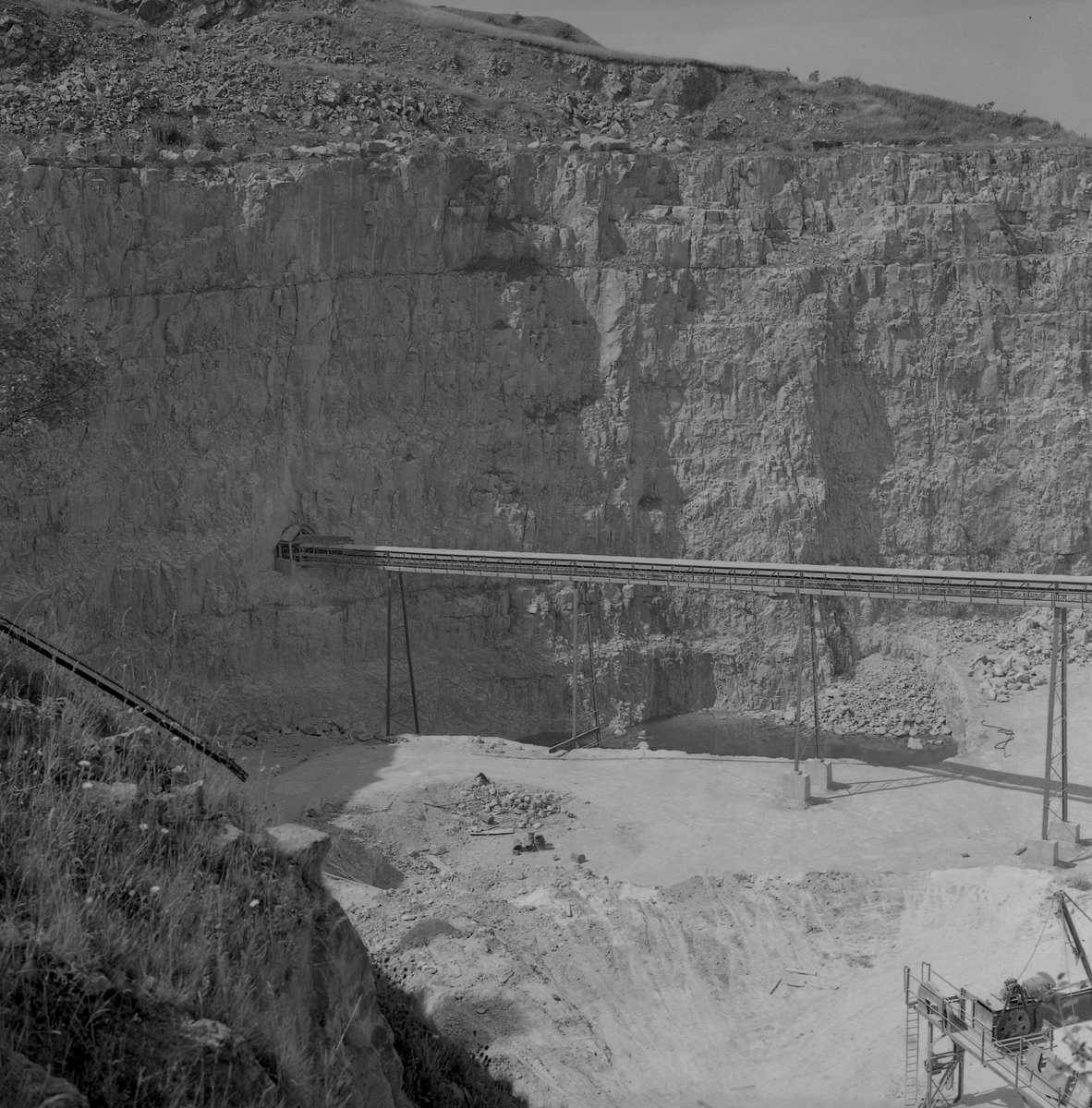 Hoptonwood Quarry, Middleton, Derbyshire. Quarry face with entrance to the mine.